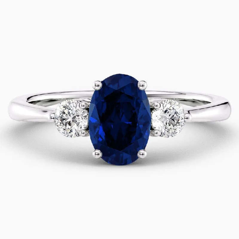 1.80 Carat Oval Shape Three Stone Blue Sapphire Engagement Ring