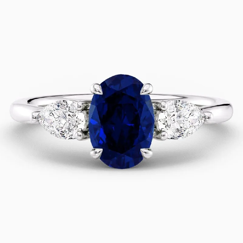 1.90 Carat Oval Shape Three Stone Blue Sapphire Engagement Ring