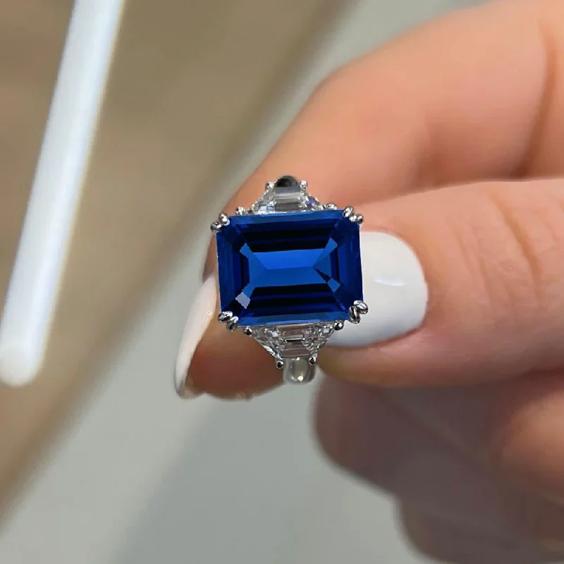 6 Carat Emerald Shape Three Stone Blue Sapphire Engagement Ring