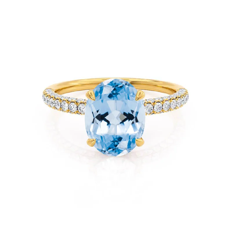 COCO - Chatham® Oval Aqua Spinel & Diamond 18k Yellow Gold Petite Hidden Halo Triple Pavé Shoulder Set Ring