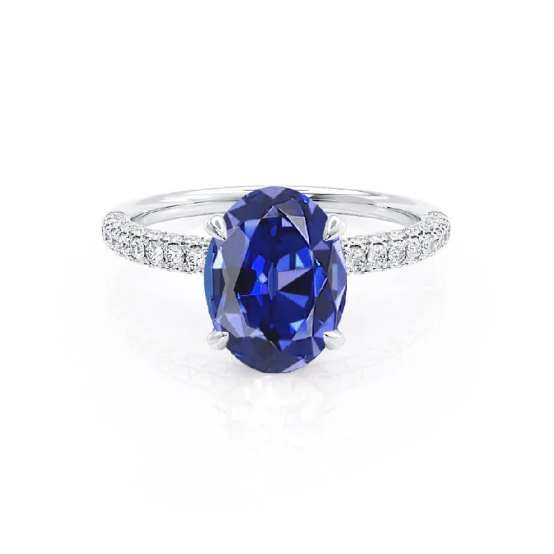 COCO - Chatham® Oval Blue Sapphire & Diamond 18k White Gold Petite Hidden Halo Triple Pavé Shoulder Set Ring